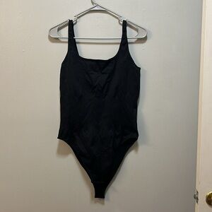 OQQ bodysuit with tank straps. Size XXL. Suck ya in REAL good.